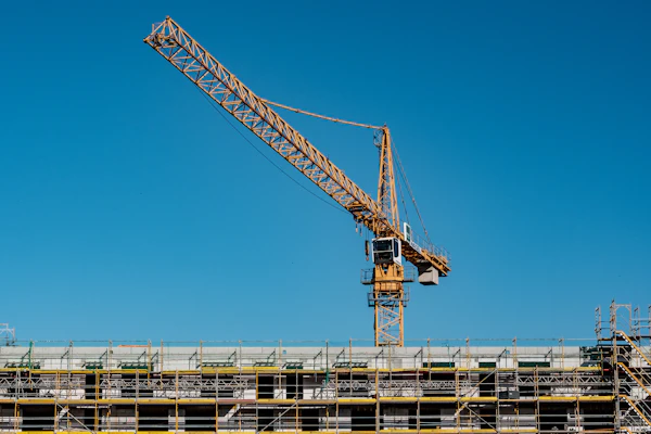 Crane over a building under construction
