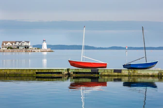 two red and blue boats