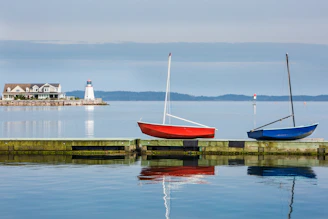 two red and blue boats