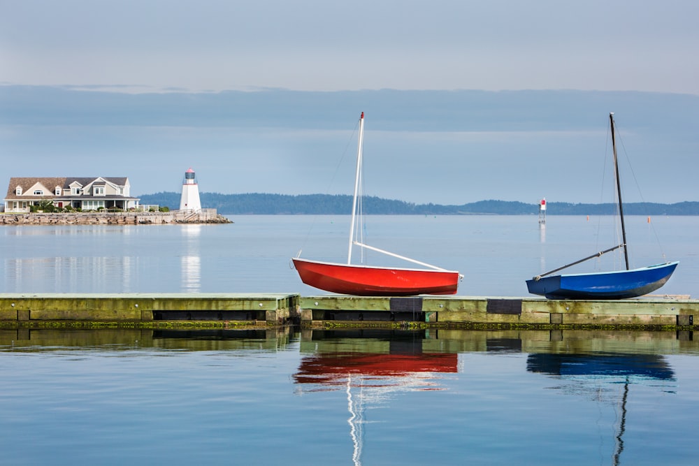 two red and blue boats