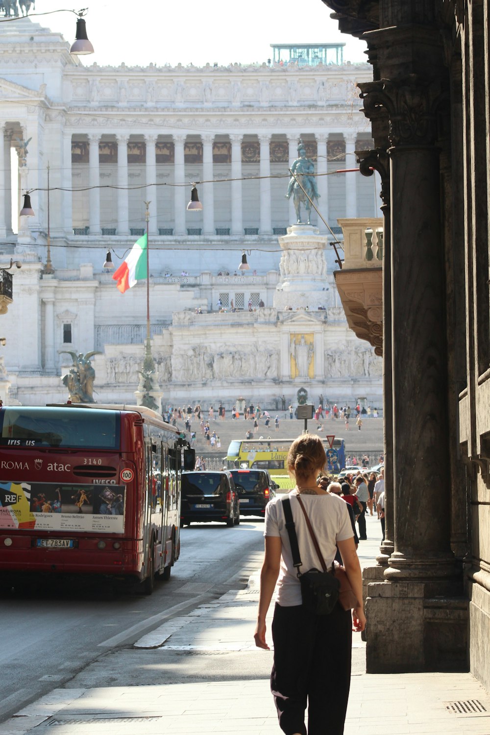 woman walking near structure