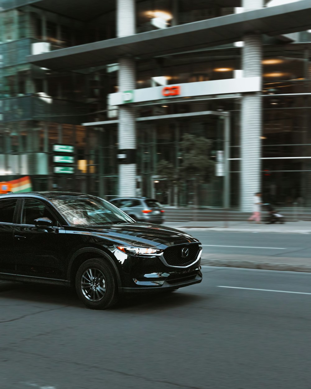 black Hyundai sedan on road