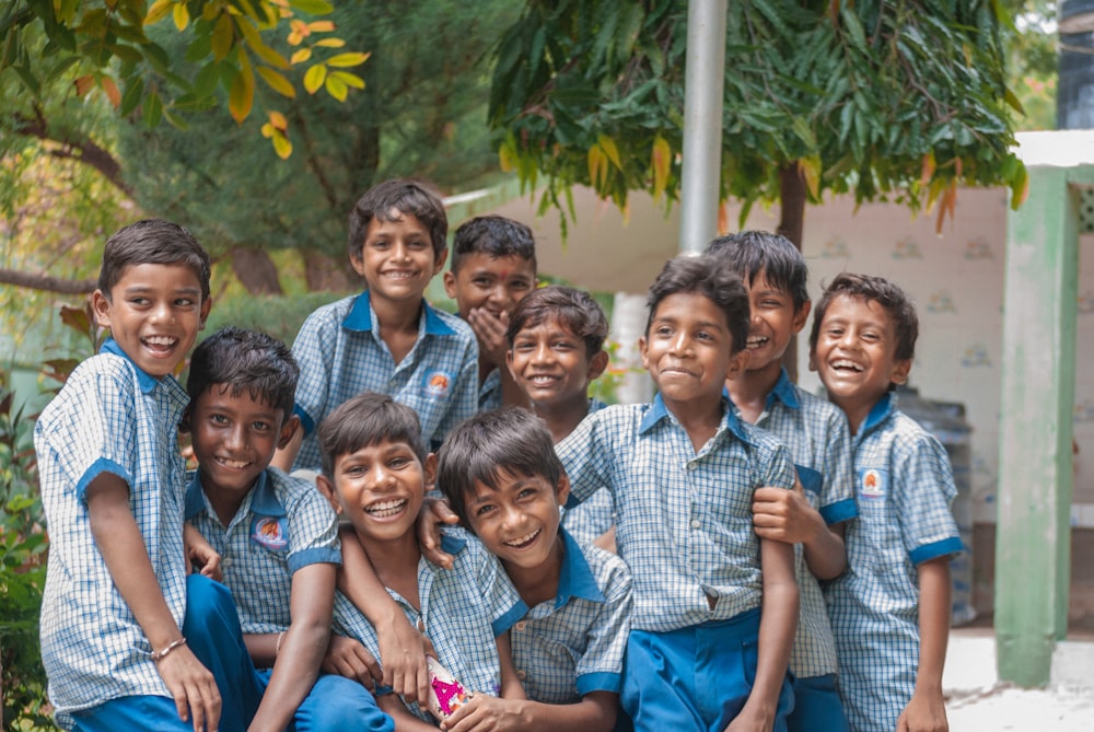 group of boys wearing blue school uniforms photo