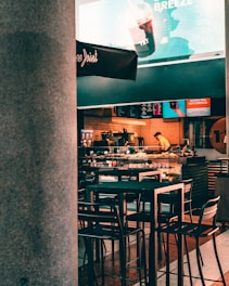 brown wooden table with chairs