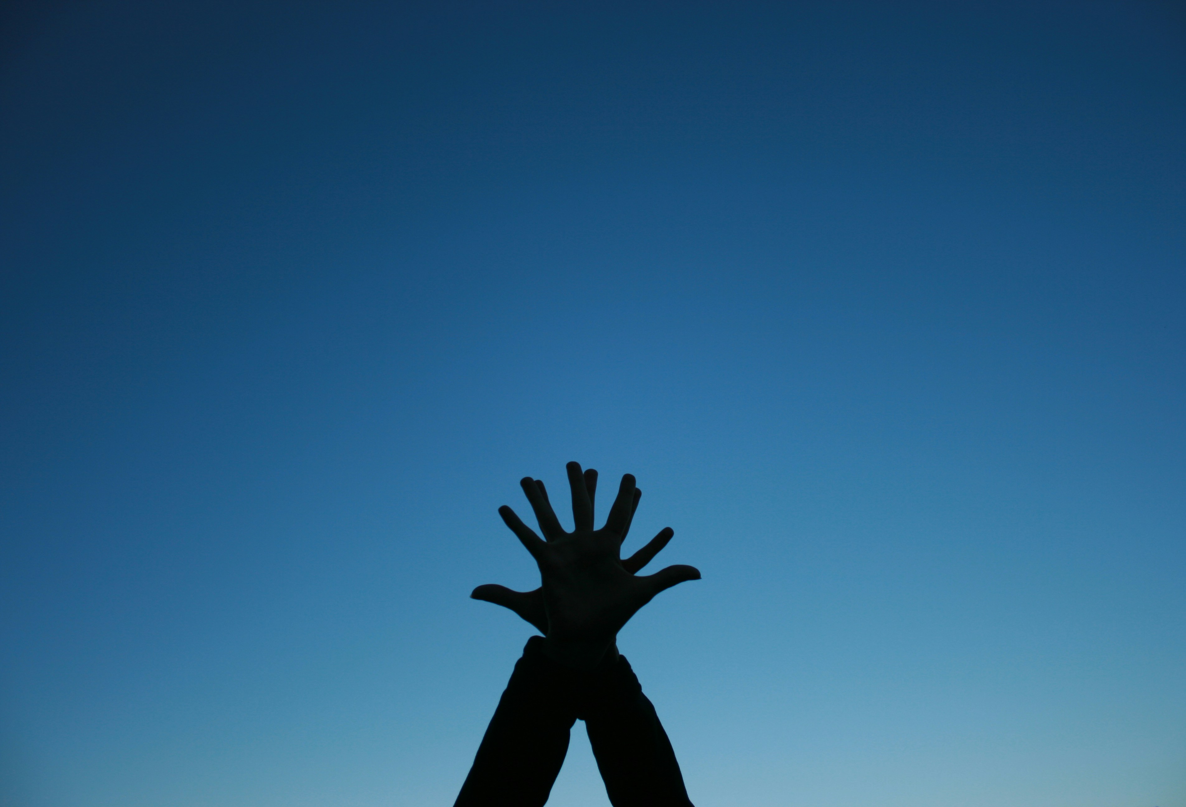 silhouette of hands