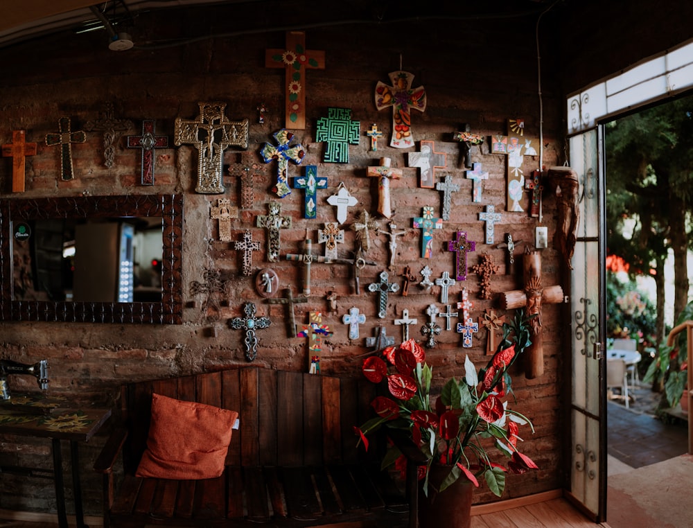 assorted-color cross hanging on the wall