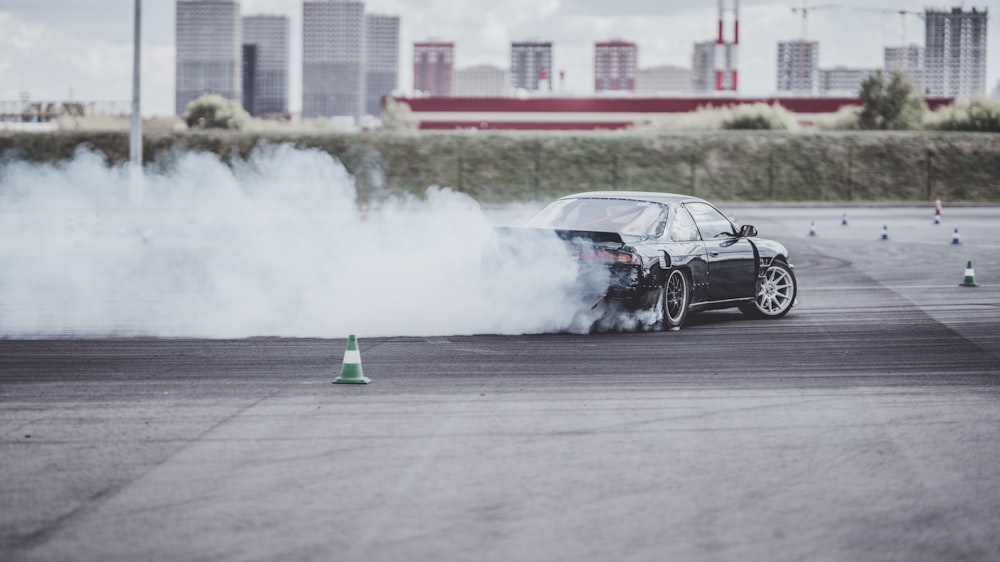 black car on road