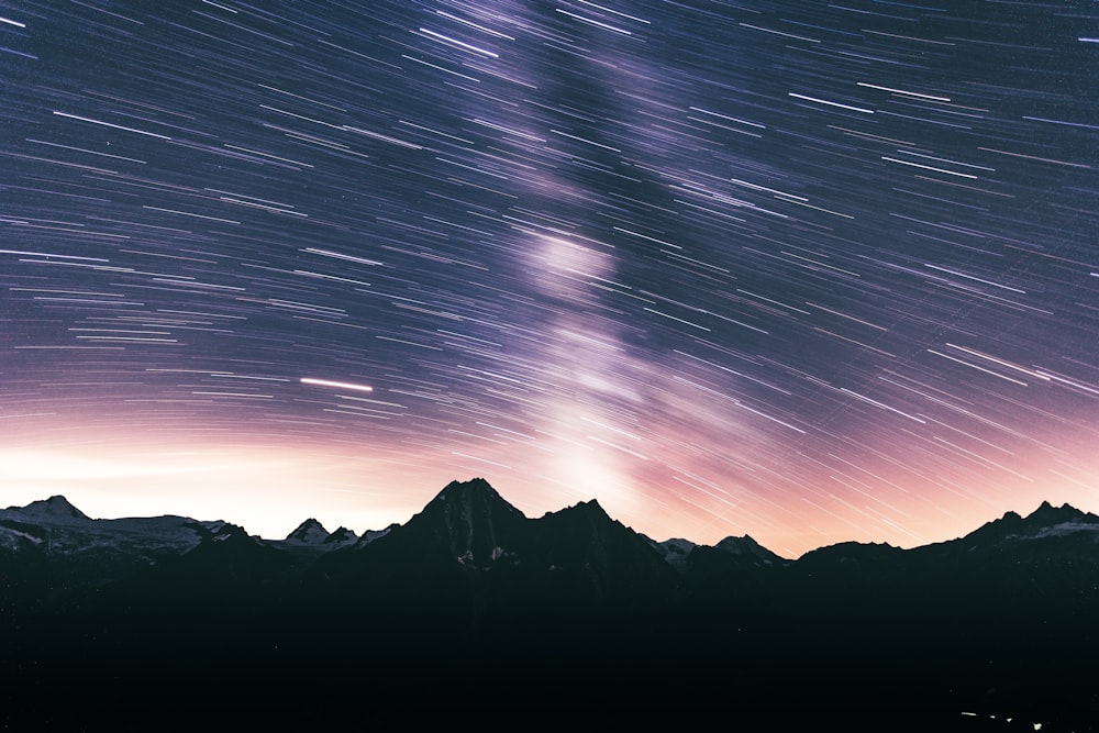 stars and mountains during night