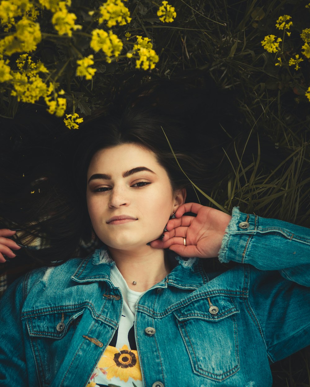 woman lying on grass