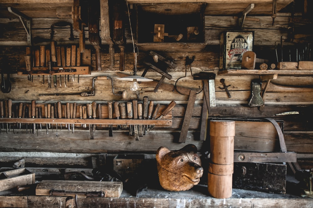 a bunch of tools hanging on a wall