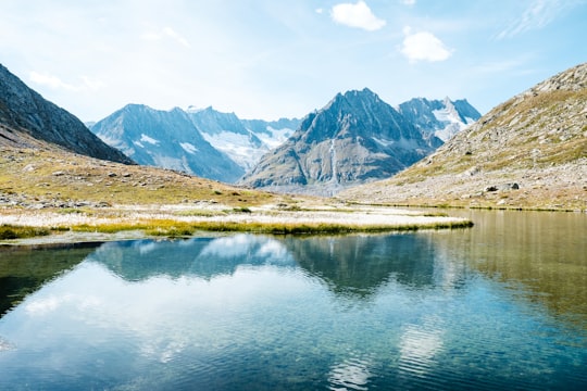 body of water near mountain in Märjelensee Switzerland