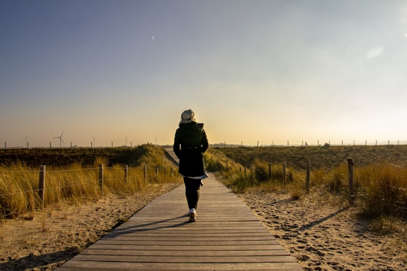 woman walking on dock