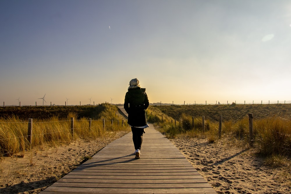 woman walking on dock