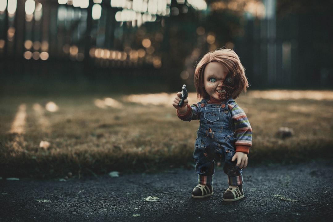 focus photography of Chucky doll