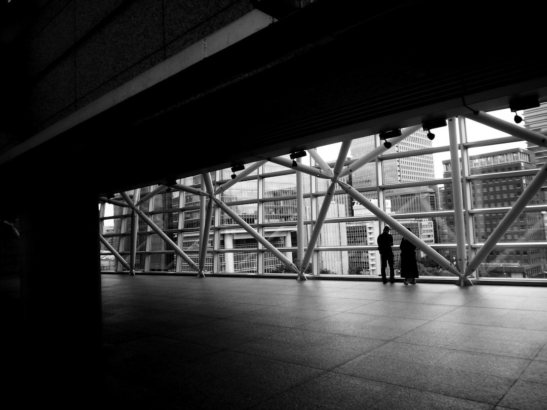 two persons standing inside room