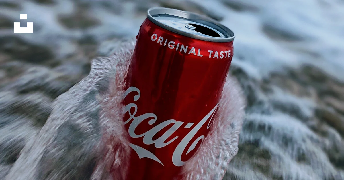 Cola Wave Splash Selective focus photography of wave splashing on red Coca-Cola can ...