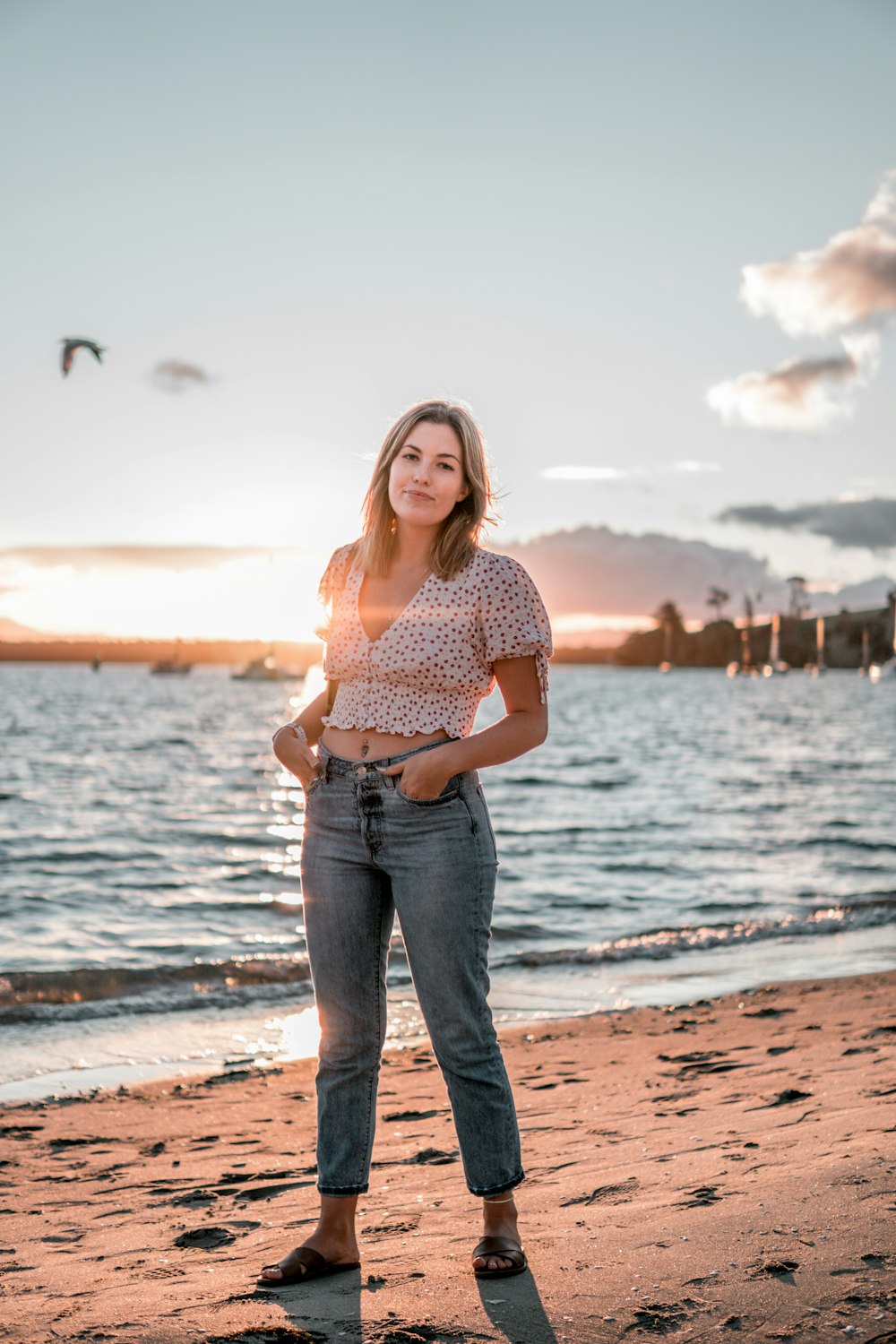 woman standing on shore