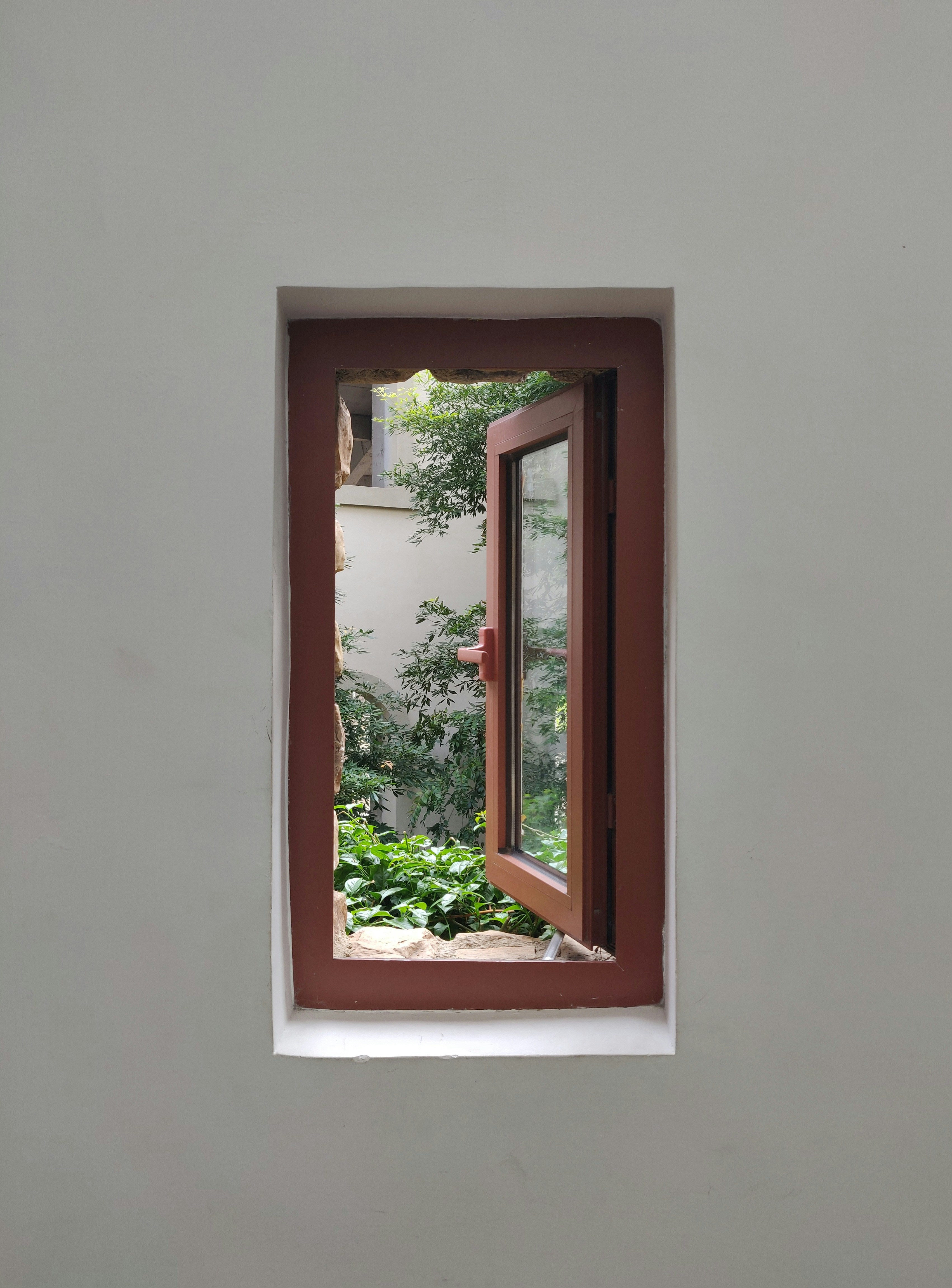 opened brown wooden framed glass window