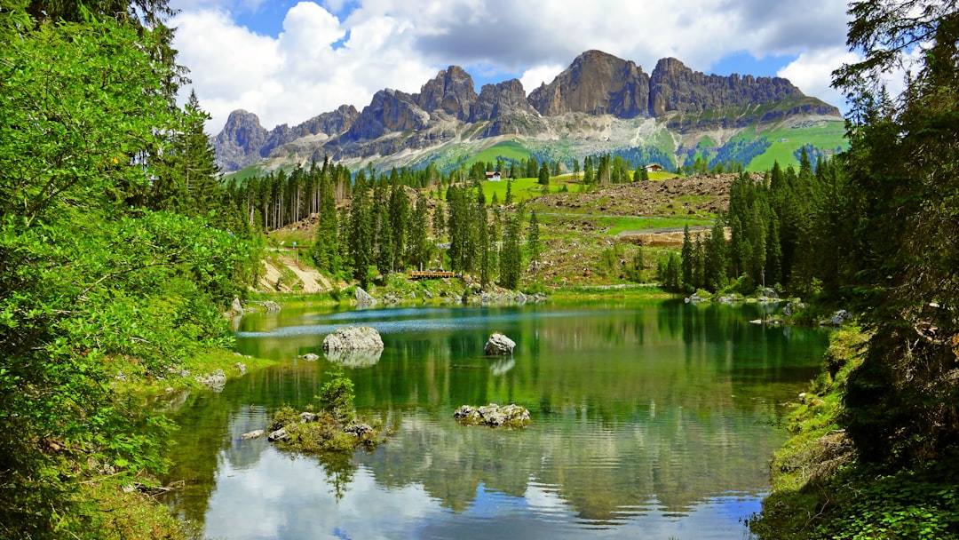 mountain ranges beside body of water