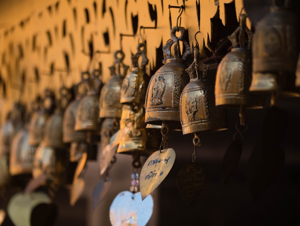 hanging brass-colored bells