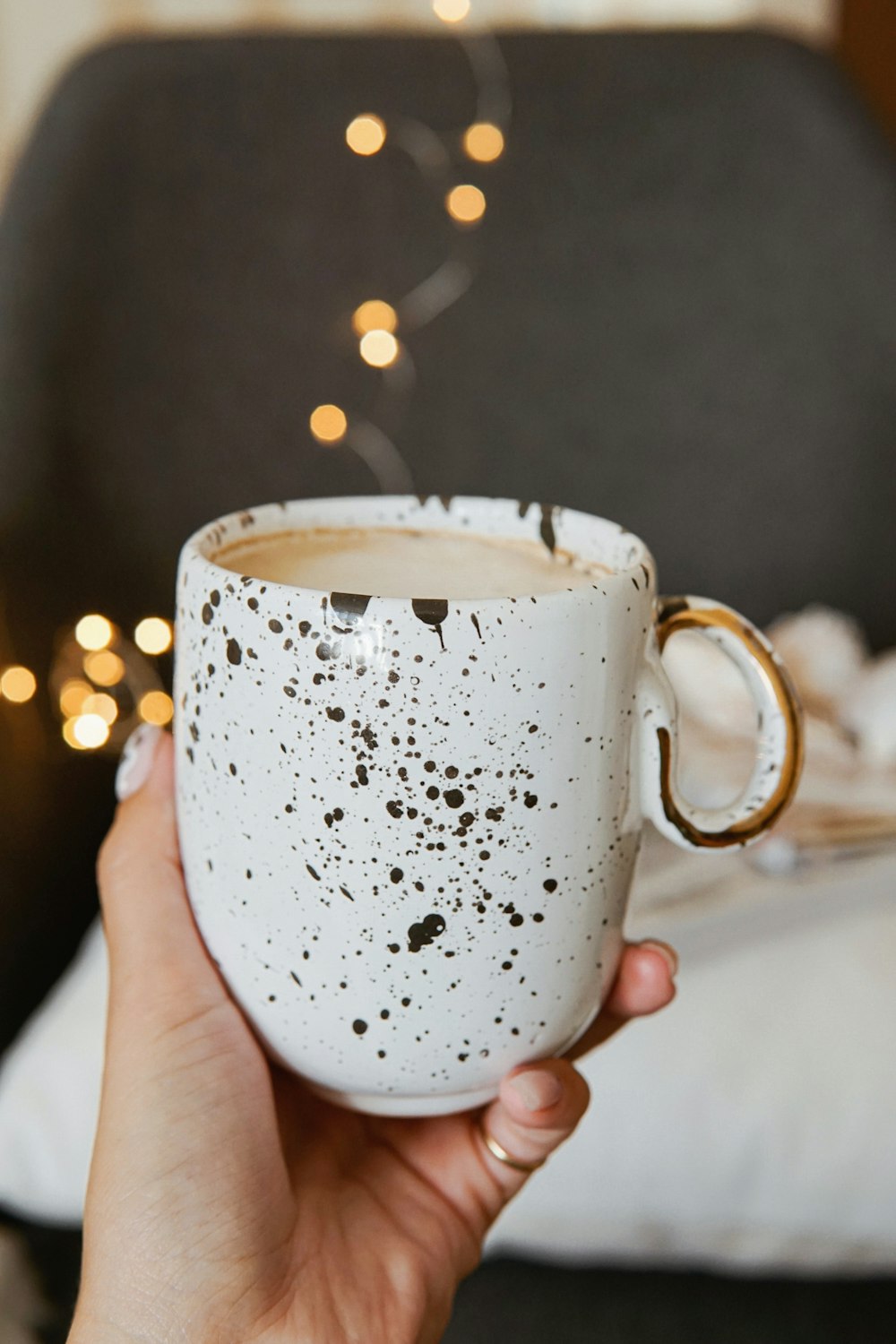 white and black ceramic mug