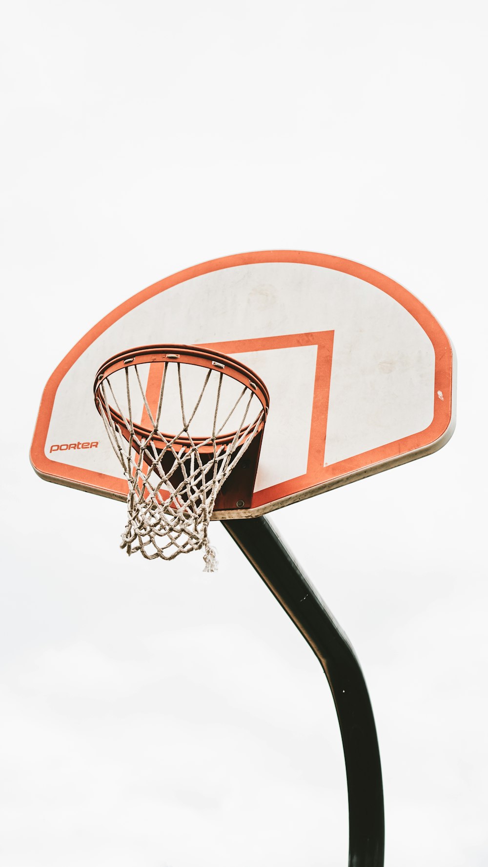 white and orange basketball hoop