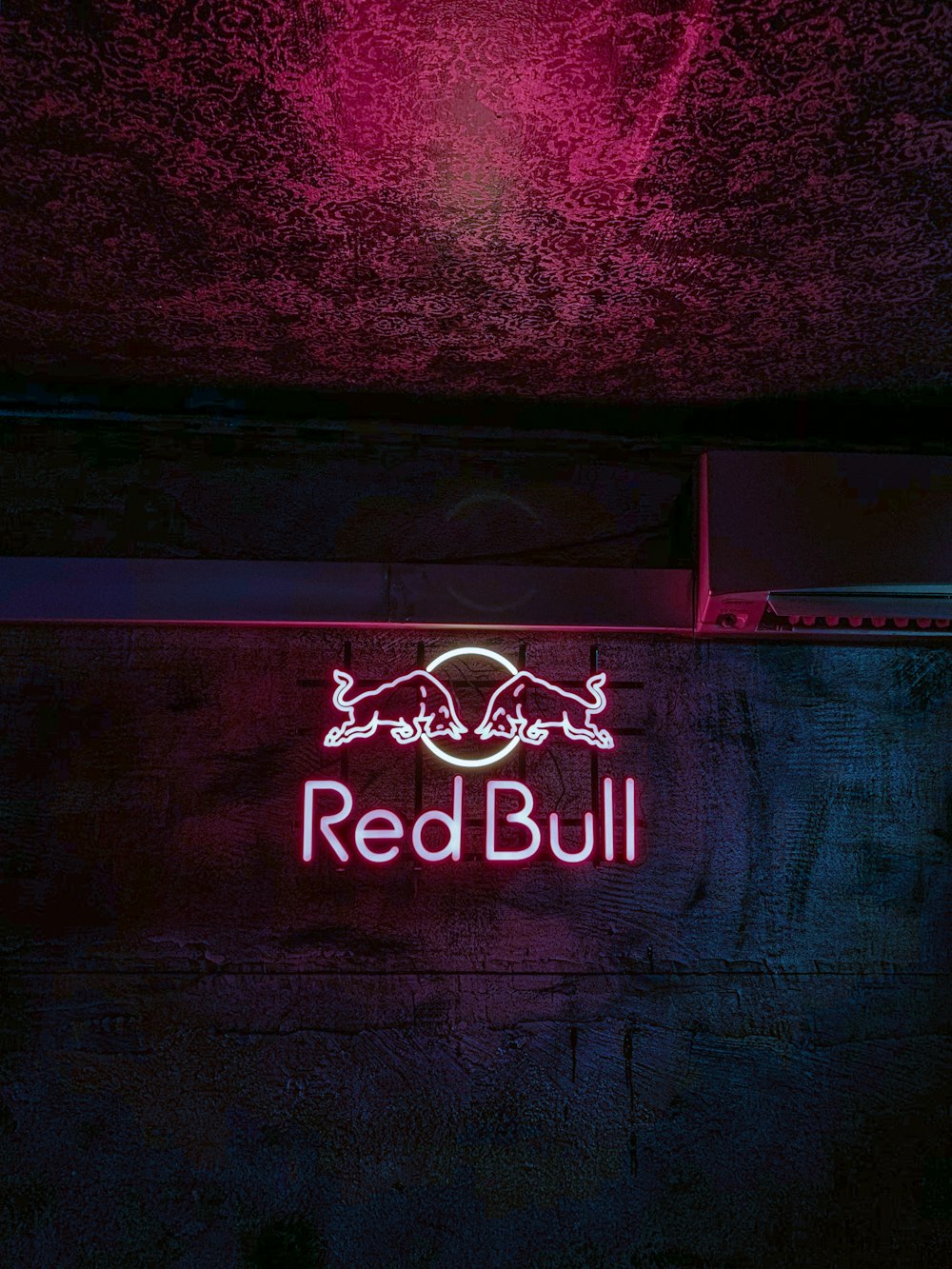 Red Bull logo neon signage turned on on wall photo – Free Brown Image on  Unsplash