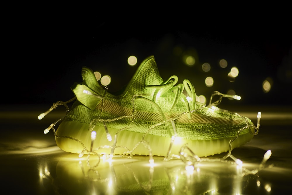 lighted green adidas sneaker