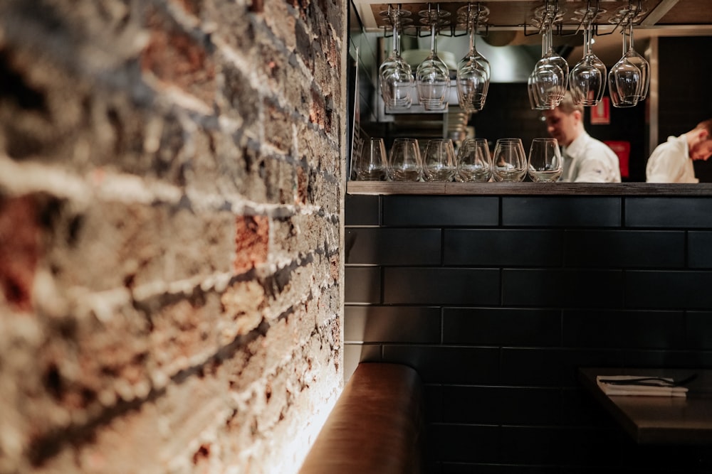 man standing on bar station