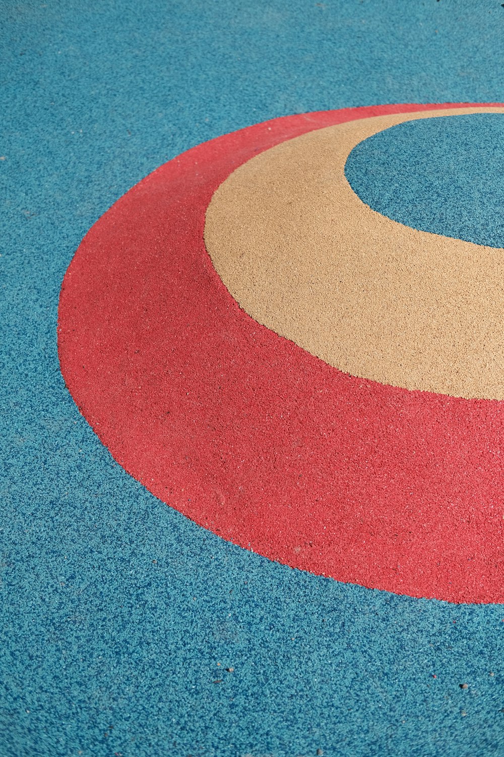 a close up of a red, white, and blue rug