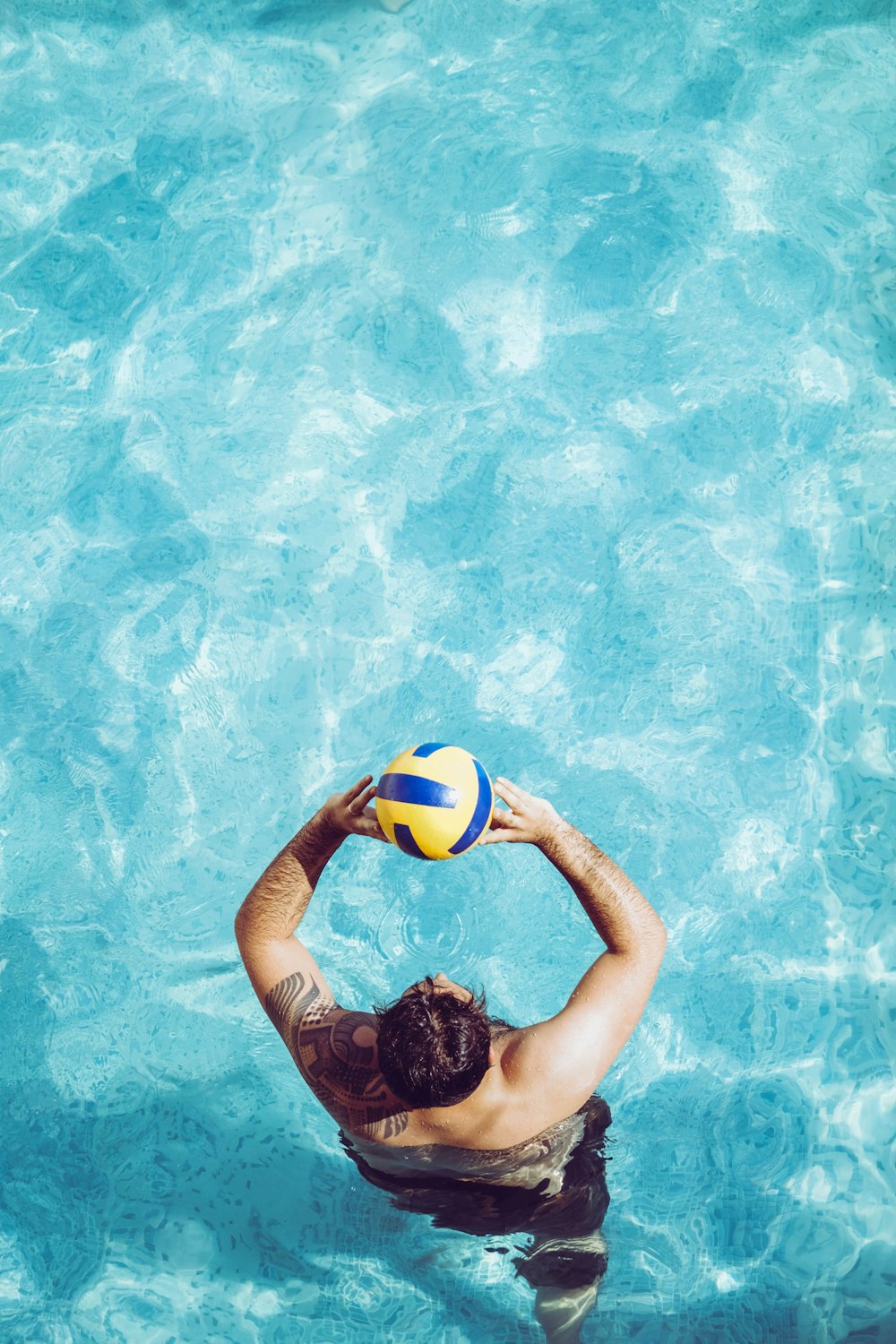 unknown person playing beach volleyball