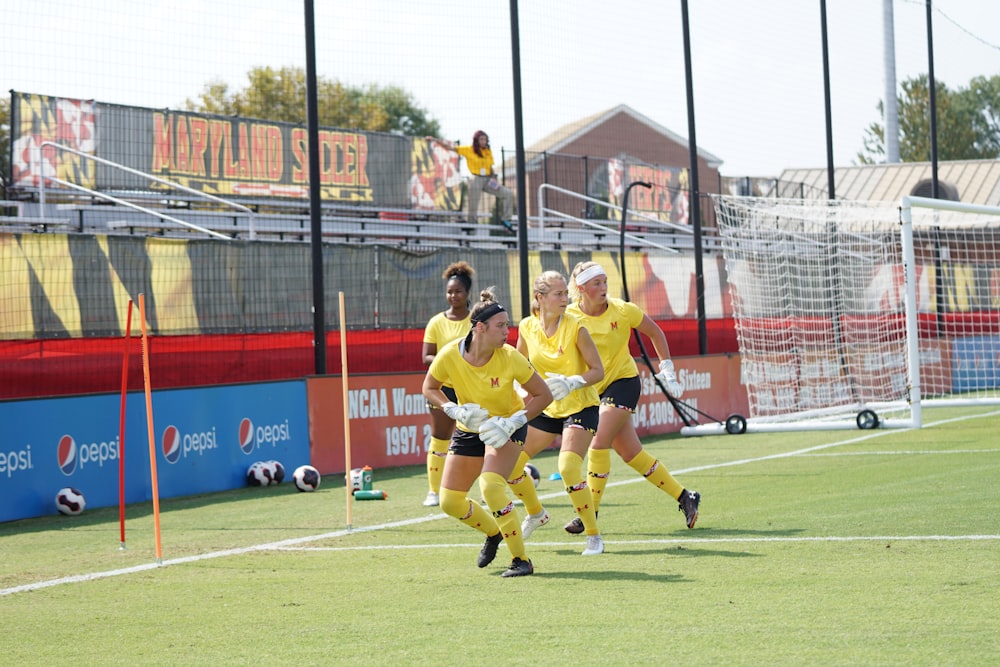 woman playing soccer on the field