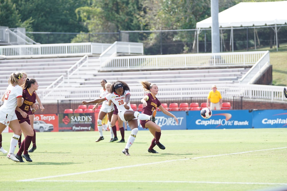 woman playing soccer on the field