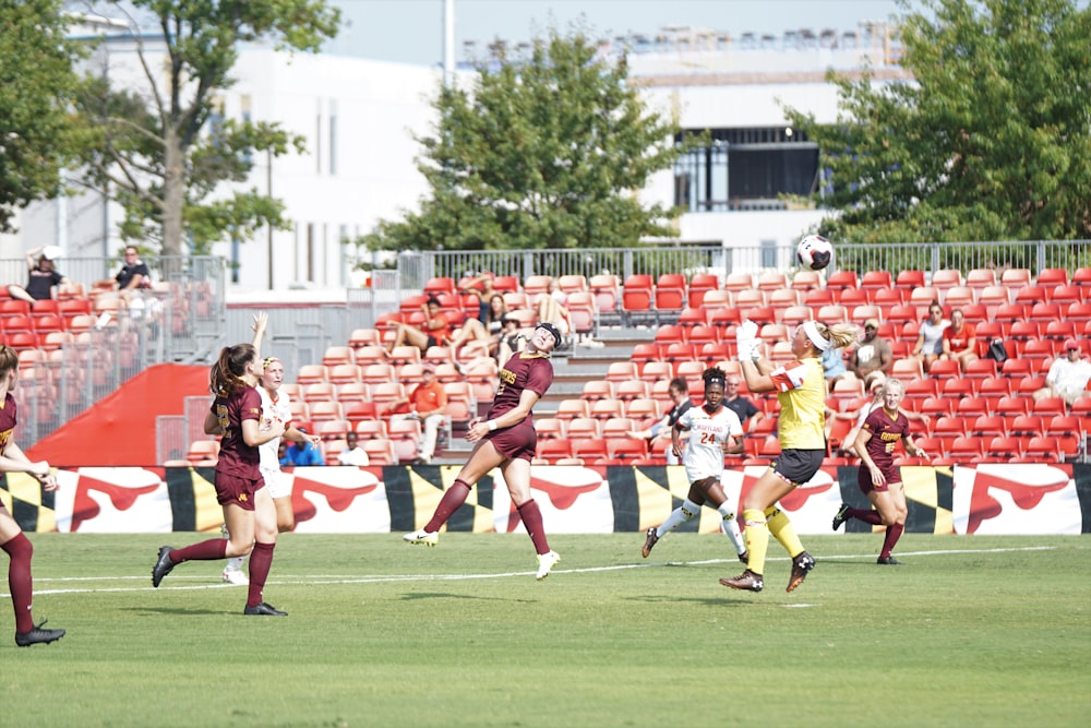 group of women playing soccer game