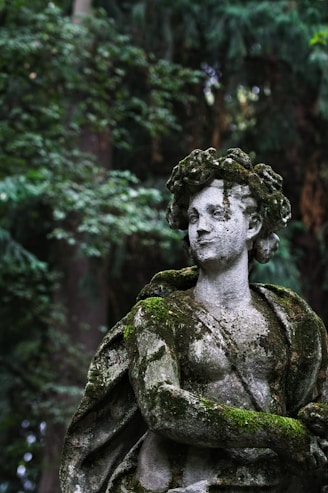 woman concrete statue at daytime