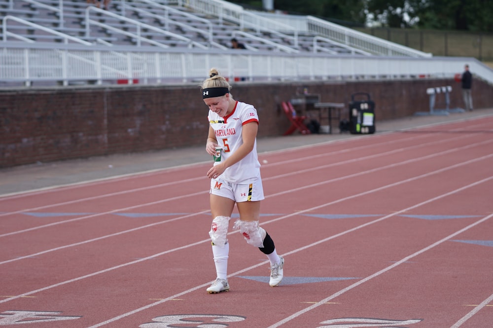 woman running on track