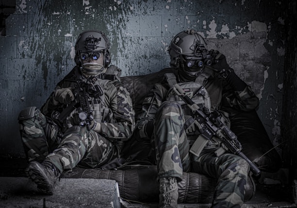 two officers sitting on sofa