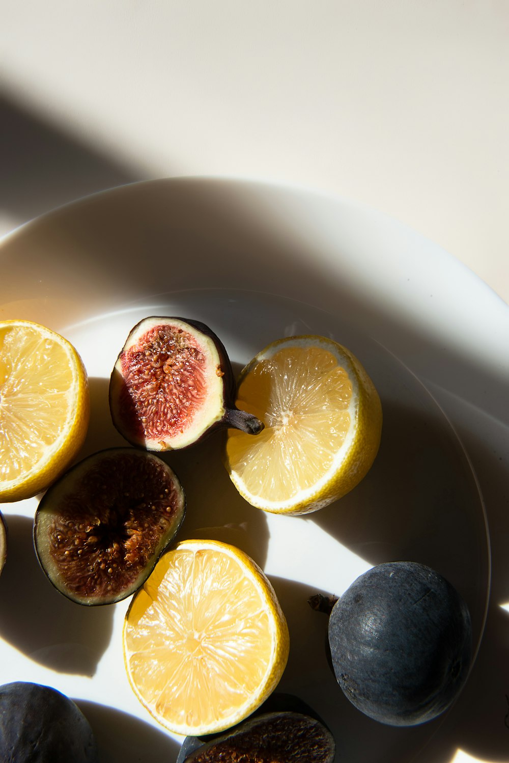 sliced fruits on plate