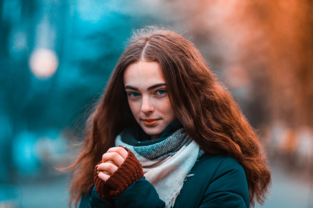 woman wearing blue coat