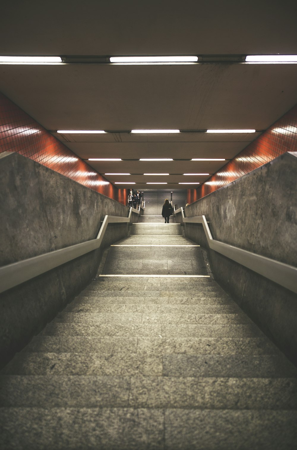 man walking down a staircase