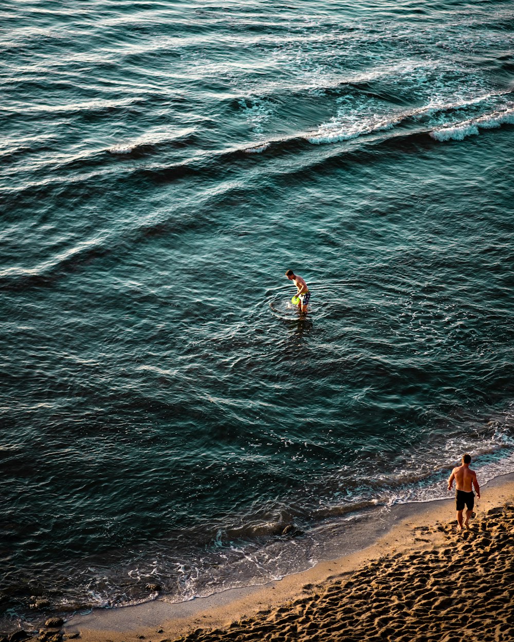 person riding surfboard