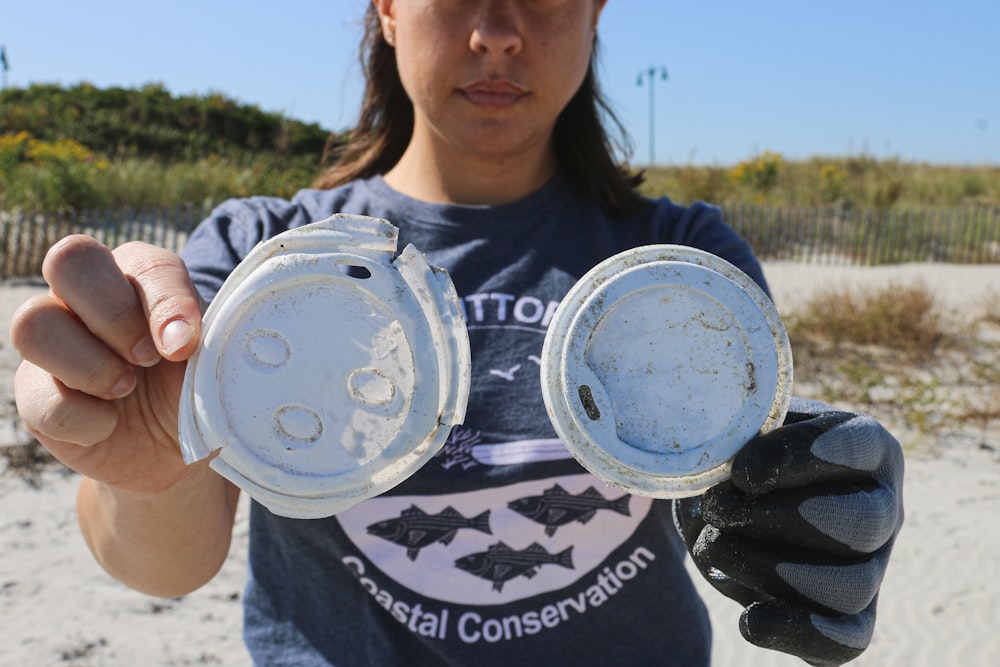 person holding plastic panel