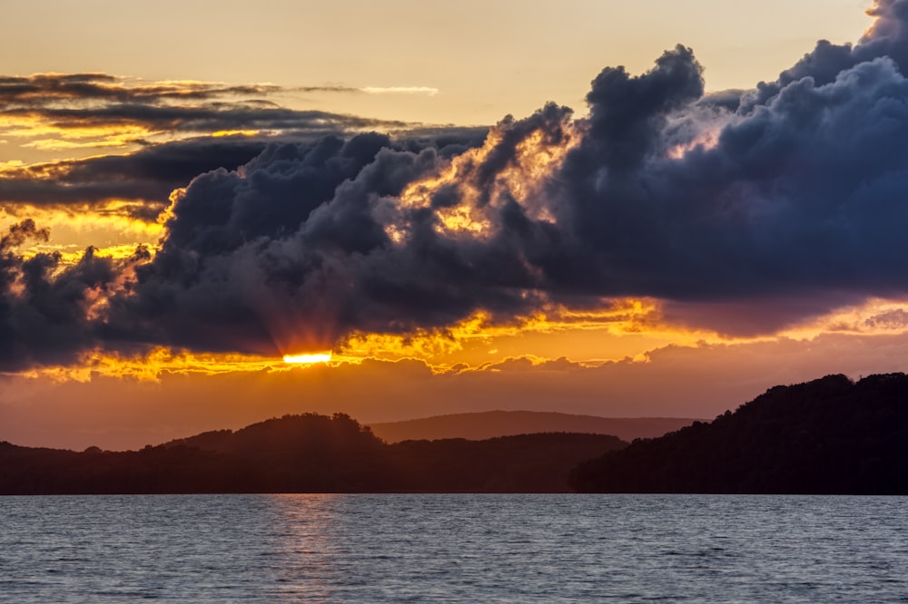 silhouette of mountains during golden hour