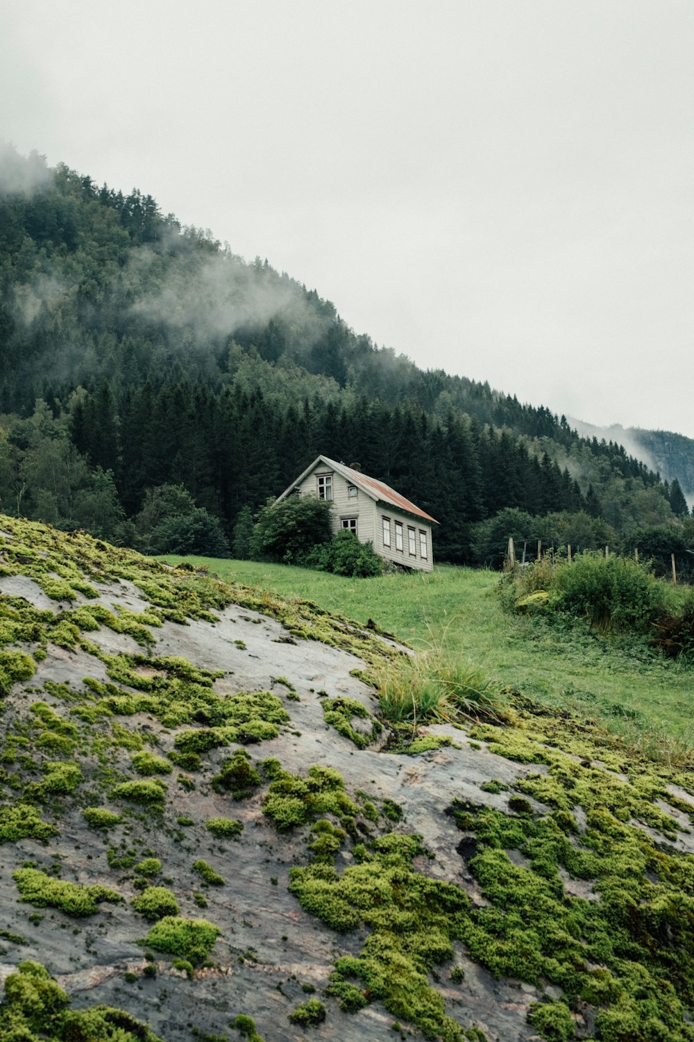 house in the mountain during daytime