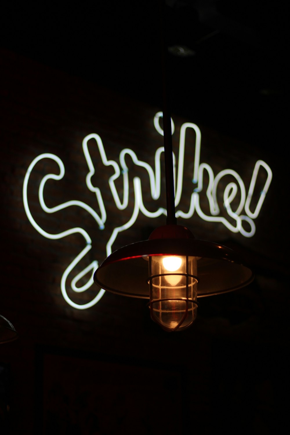 white Strike! neon light signage