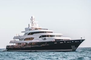 Private luxury yacht with Palm Jumeirah in background