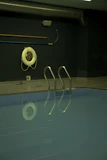 white lifebuoy near swimming pool