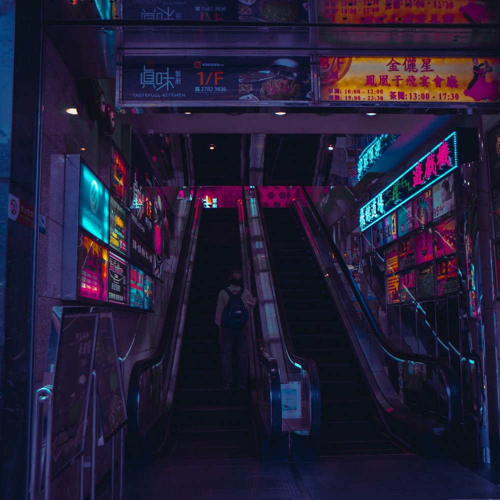 person on escalator