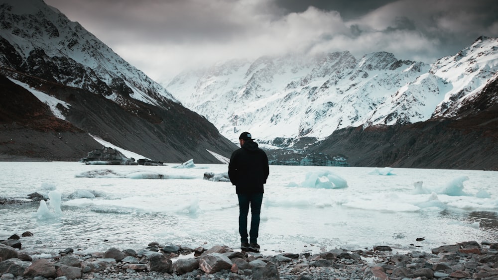 man standing on body of water