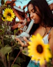 woman ripping a glass bong